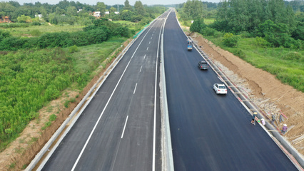 通車在即┃信陽G312線新建公路工程Ⅱ標段主線瀝青攤鋪完成